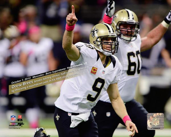 Drew Brees breaks Johnny Unitas' half-century-old record by throwing a touchdown pass in his 48th straight game- Mercedes-Benz Superdome- New Orleans, LA October 7, 2012