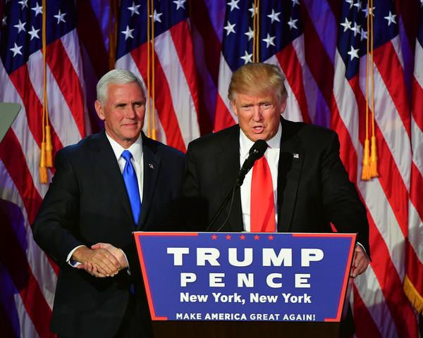 President-elect Donald Trump with Governor Mike Pence addresses his supporters at an election night event 11/8/2016 in New York City