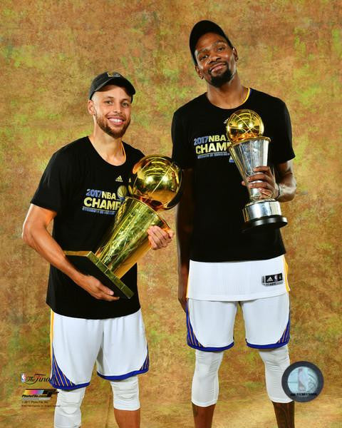 Kevin Durant & Stephen Curry with the 2017 MVP & NBA Championship Trophies Game 5 of the 2017 NBA Finals