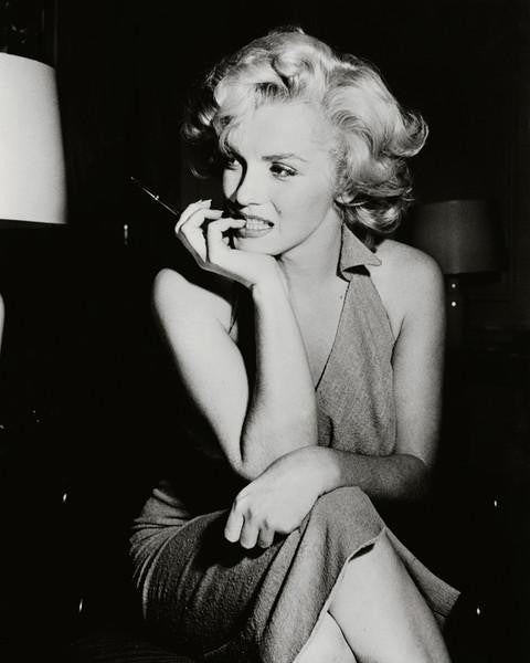 Marilyn Monroe - 1954 (wearing dress, sitting)  photo